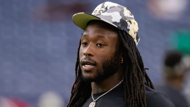 Saints running back Alvin Kamara walks on the field ahead of a preseason game on Aug. 13, 2022.